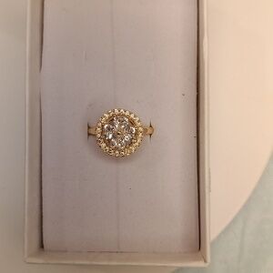 Gold spinning flower ring